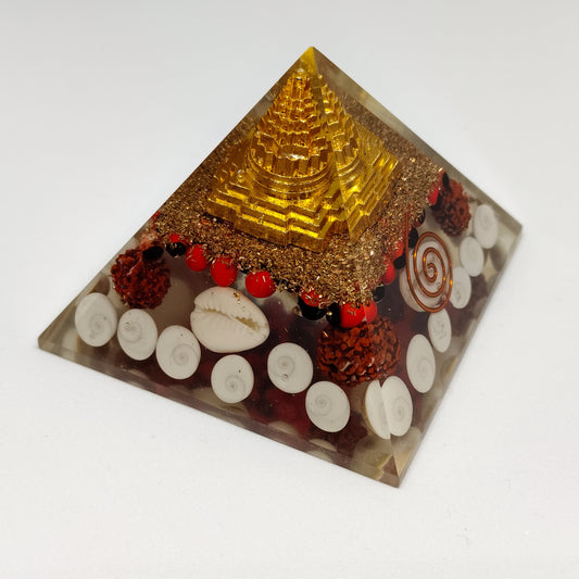 Shree Yantra Pyramid | With Rudraksha, Cowdi, Gomati Chakra, Gunja and Copper Coil
