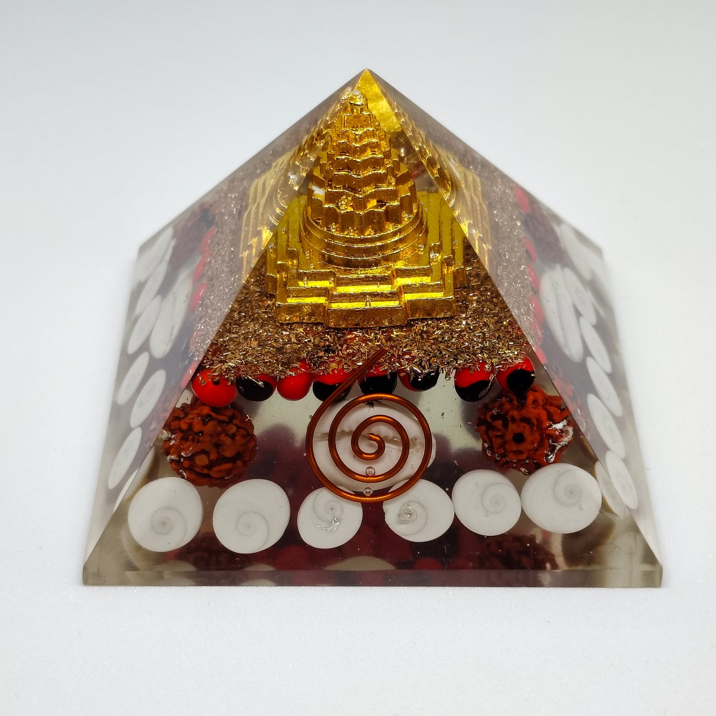 Shree Yantra Pyramid | With Rudraksha, Cowdi, Gomati Chakra, Gunja and Copper Coil